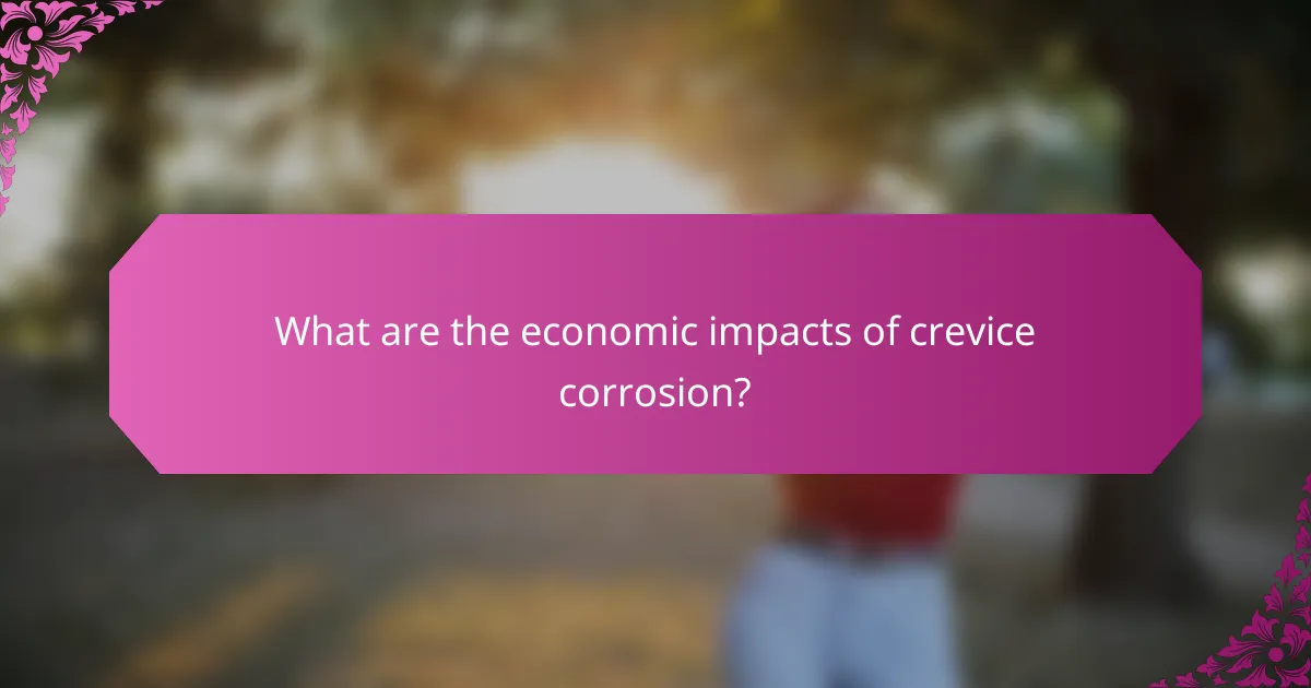 What are the economic impacts of crevice corrosion?